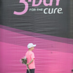 Little boy with flowers Susan G. Komen -Day Breast Cancer Walk