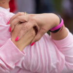 Holding hands breast cancer 3-day walk