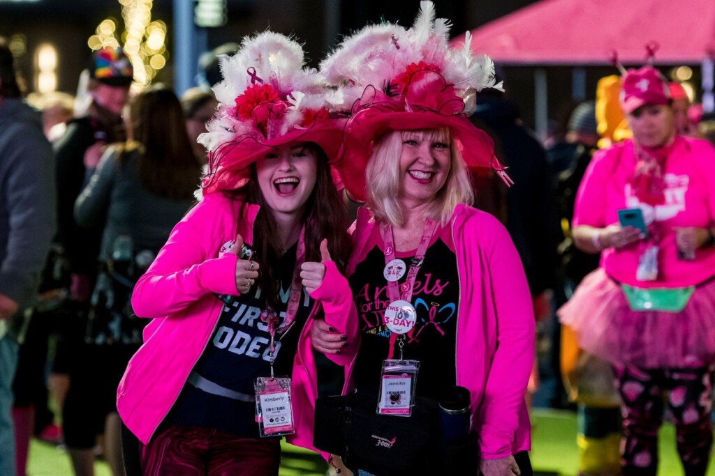 Kim and her mom, Jennifer, at the 3-Day in pink hats.