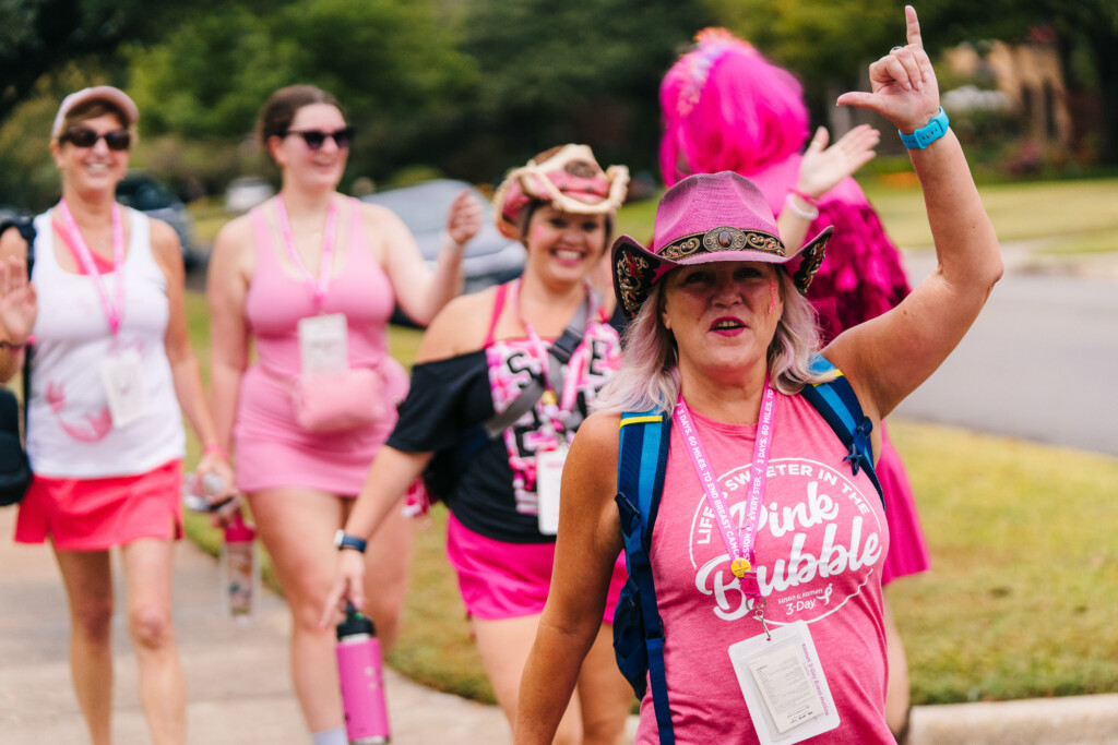 Women in pink cowboy hats at the 2025 Dallas/Fort Worth Komen 3-Day