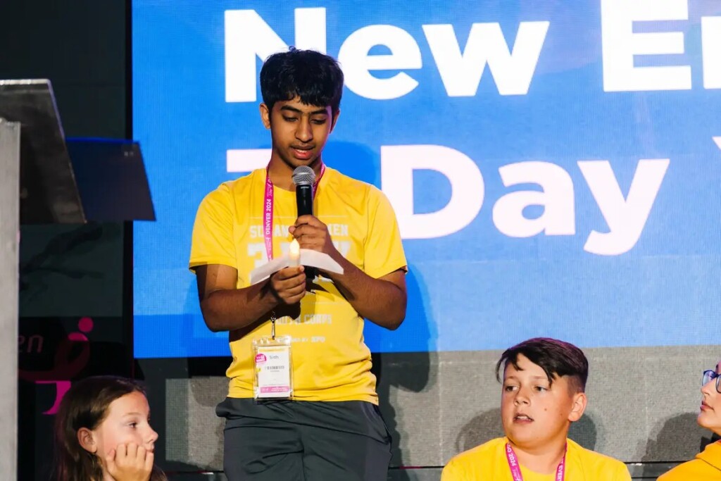 Sidh J. speaking about his family ties to breast cancer at the Susan G. Komen New England 3-Day.
