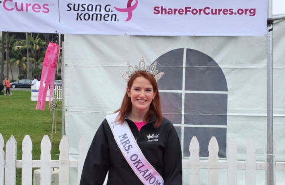 Jessica Ashmore wearing her Mrs. Oklahoma crown and sash at the ShareForCures tent at the San Diego 3-Day.