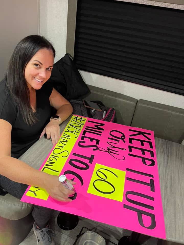 Tamara M. making her "Crazy Sign Lady" signs to support the walkers of the Susan G. Komen San Diego 3-Day.