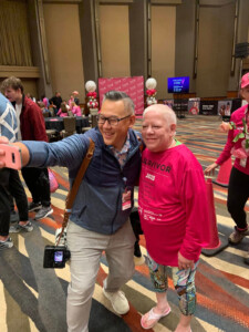 3-Day photographer Mike D. poses with a survivor at the Komen 3-Day.