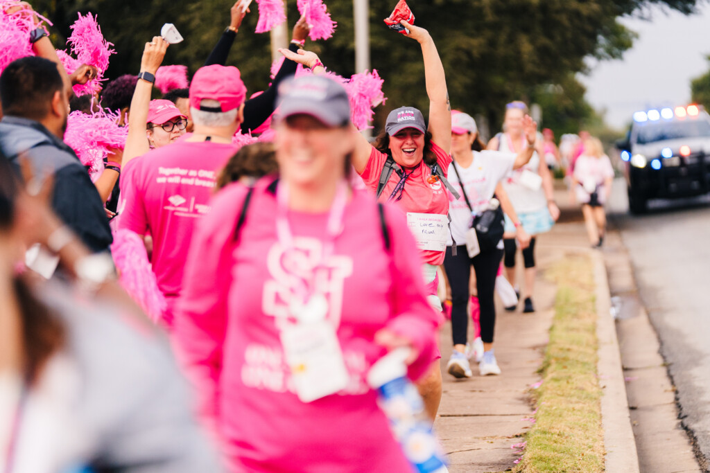 Walkers line a street at the 2025 Dallas/Fort Worth 3-Day.