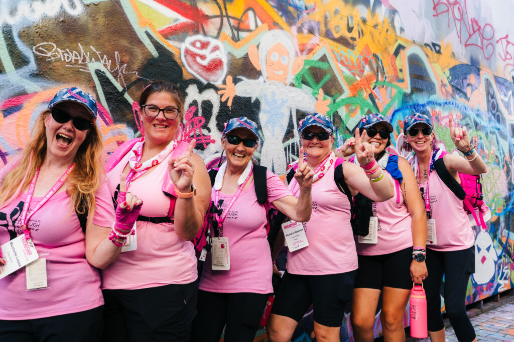 A group of 3-Day walkers at Graffiti Alley at the 2025 Boston 3-Day.
